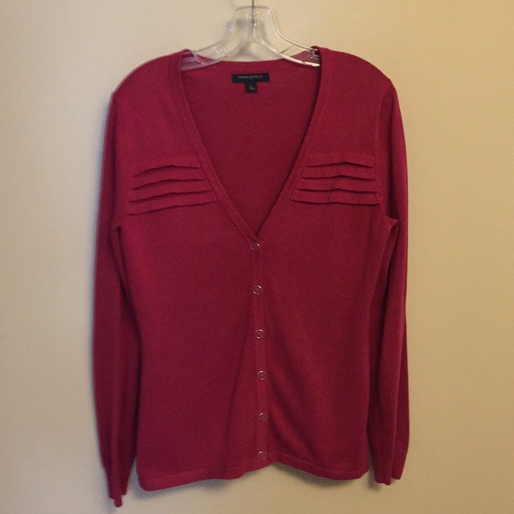 Magenta/ reddish colored cardigan